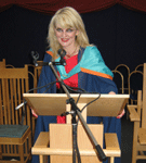 Dr Alison Younger at lecture podium in Cork